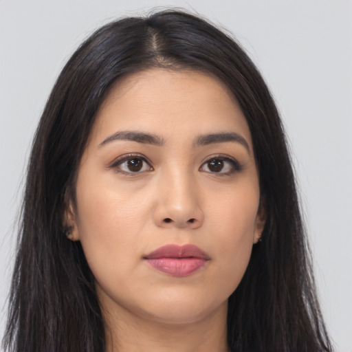 Neutral asian young-adult female with long  brown hair and brown eyes
