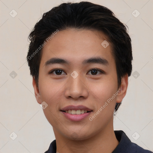 Joyful asian young-adult male with short  black hair and brown eyes