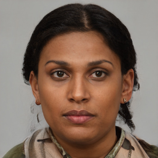 Neutral latino young-adult female with short  brown hair and brown eyes