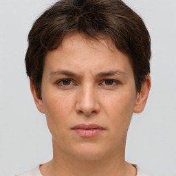 Neutral white young-adult female with short  brown hair and brown eyes