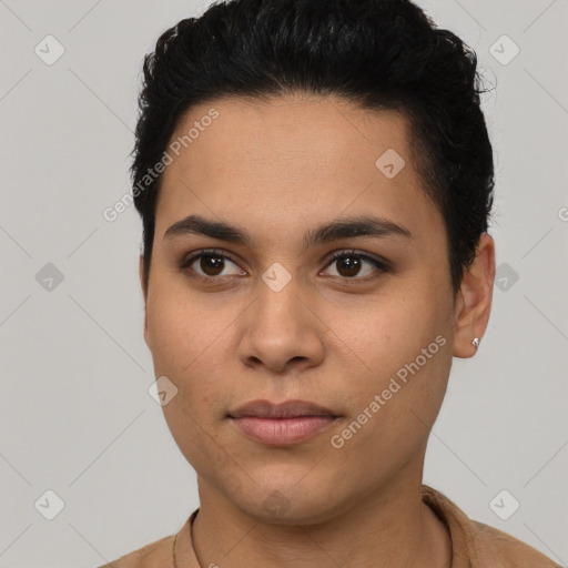 Joyful latino young-adult female with short  brown hair and brown eyes