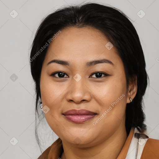 Joyful asian young-adult female with medium  black hair and brown eyes