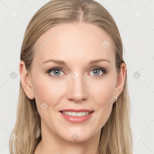 Joyful white young-adult female with long  brown hair and blue eyes