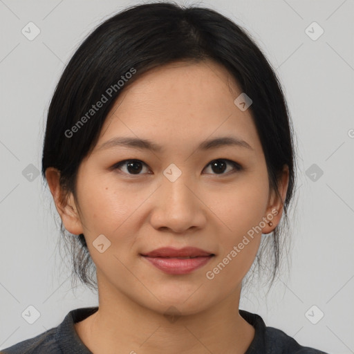 Joyful latino young-adult female with medium  black hair and brown eyes