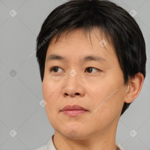 Neutral asian young-adult male with short  brown hair and brown eyes