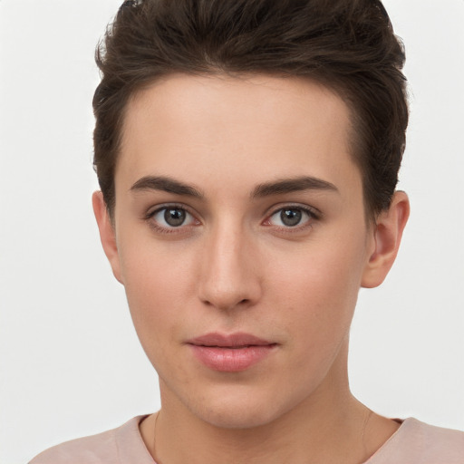 Neutral white young-adult female with short  brown hair and brown eyes