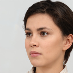 Neutral white young-adult female with short  brown hair and brown eyes