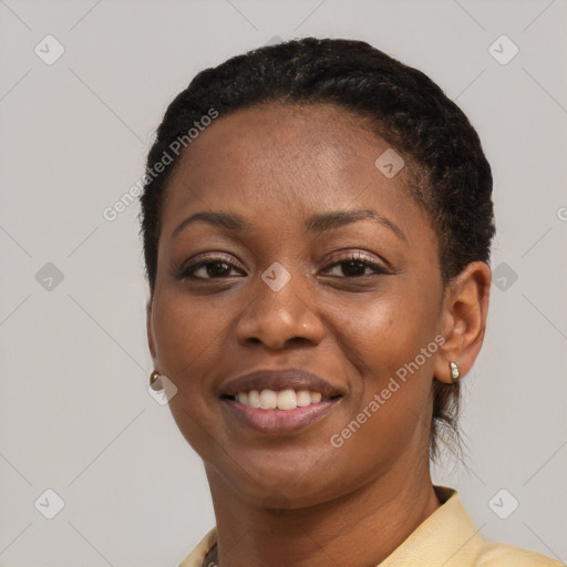 Joyful latino young-adult female with short  black hair and brown eyes