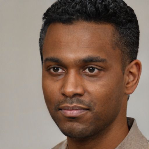Neutral black young-adult male with short  black hair and brown eyes