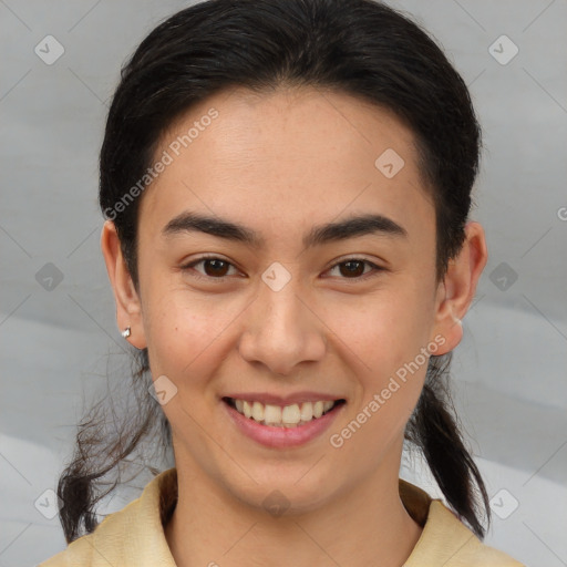 Joyful latino young-adult female with medium  brown hair and brown eyes