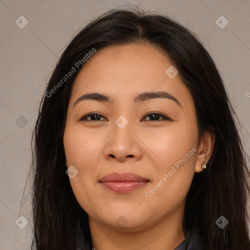 Joyful asian young-adult female with long  brown hair and brown eyes