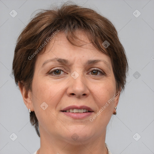 Joyful white adult female with short  brown hair and brown eyes