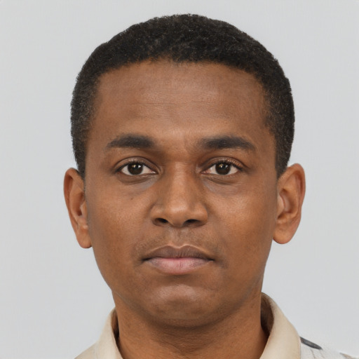 Neutral black young-adult male with short  brown hair and brown eyes