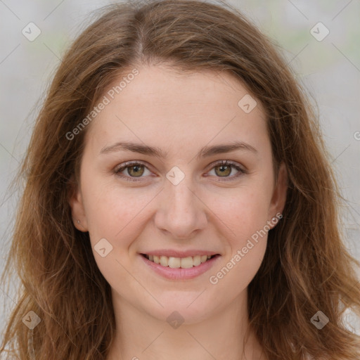 Joyful white young-adult female with long  brown hair and green eyes