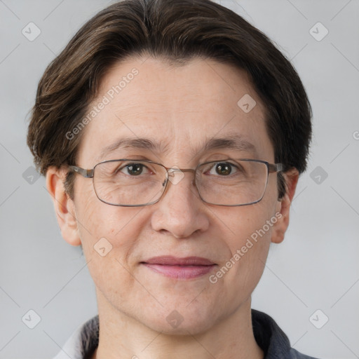 Joyful white adult female with short  brown hair and brown eyes