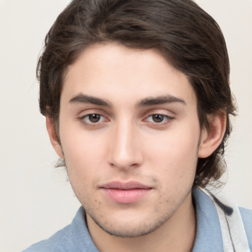 Neutral white young-adult male with medium  brown hair and brown eyes