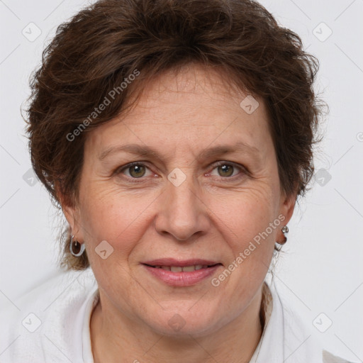 Joyful white adult female with short  brown hair and brown eyes