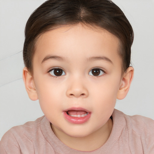 Joyful white child female with short  brown hair and brown eyes