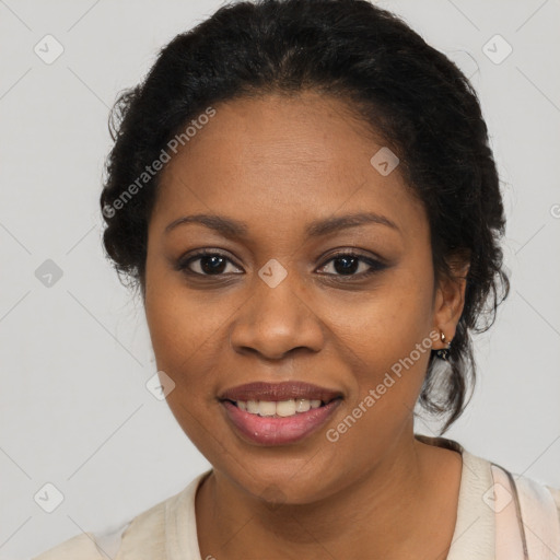 Joyful black young-adult female with long  brown hair and brown eyes