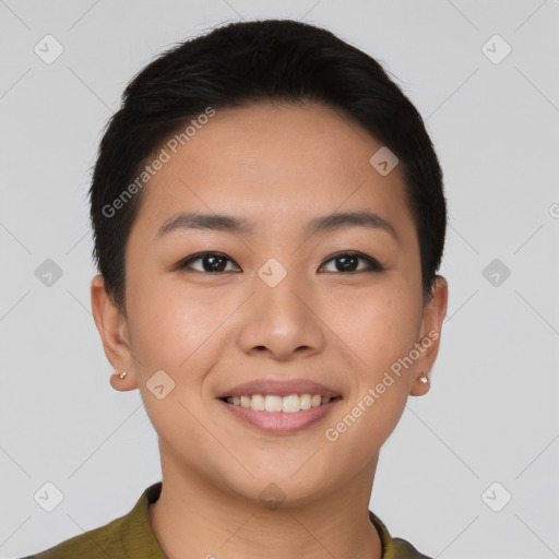 Joyful asian young-adult female with short  brown hair and brown eyes