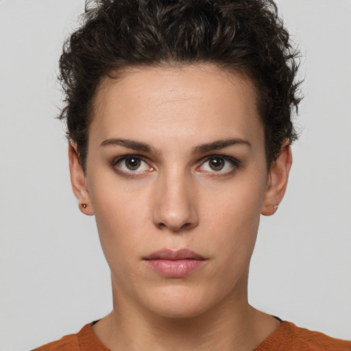 Neutral white young-adult female with short  brown hair and brown eyes