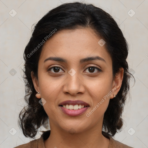 Joyful latino young-adult female with medium  brown hair and brown eyes