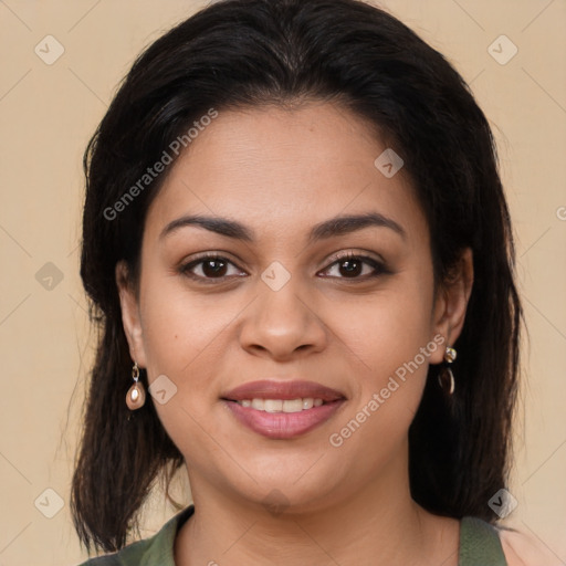 Joyful latino young-adult female with long  brown hair and brown eyes