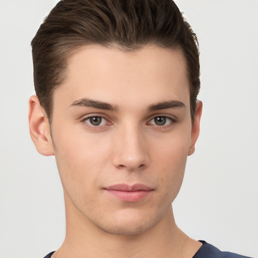 Neutral white young-adult male with short  brown hair and brown eyes