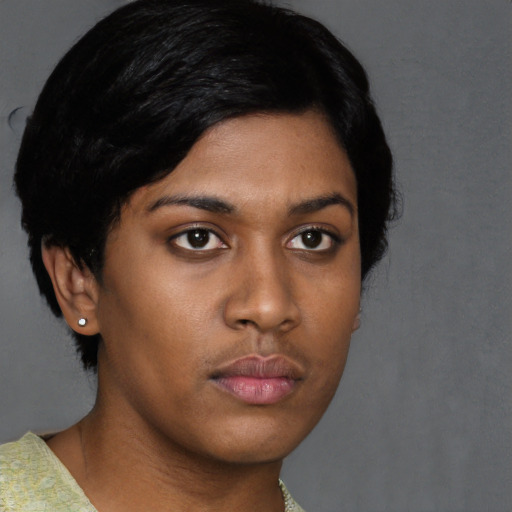 Neutral asian young-adult female with short  black hair and brown eyes