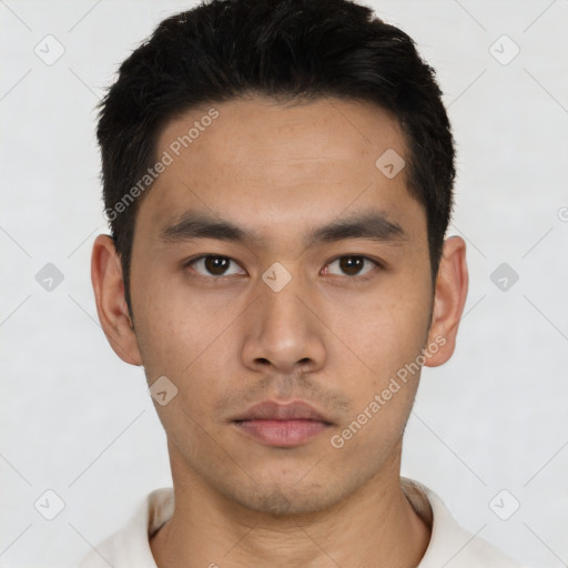 Neutral asian young-adult male with short  black hair and brown eyes