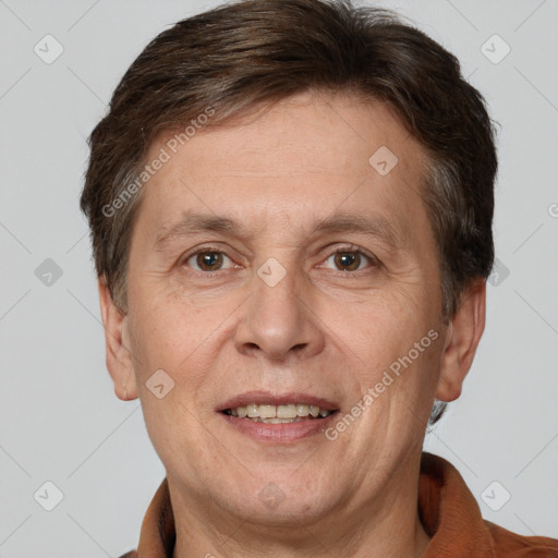 Joyful white adult male with short  brown hair and brown eyes