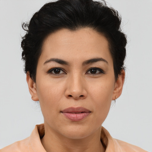 Joyful asian young-adult female with short  brown hair and brown eyes