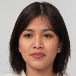 Neutral asian young-adult female with medium  brown hair and brown eyes