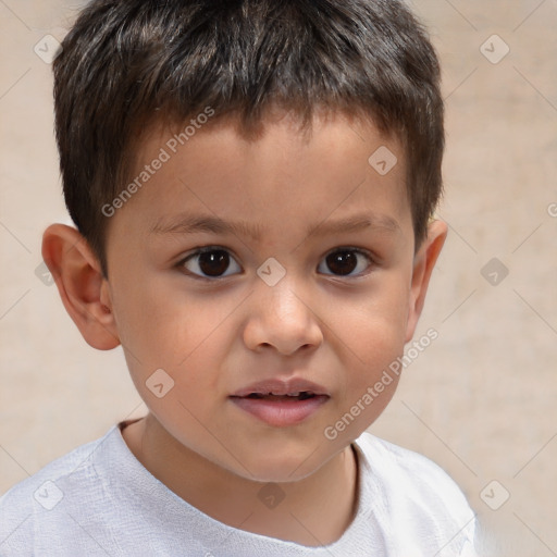 Joyful white child male with short  brown hair and brown eyes