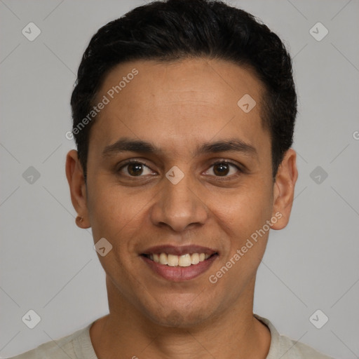 Joyful latino young-adult male with short  black hair and brown eyes