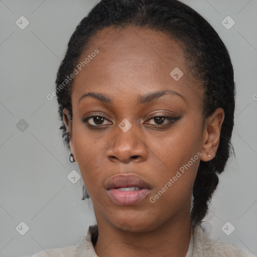 Neutral black young-adult female with medium  brown hair and brown eyes