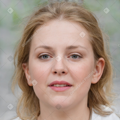 Joyful white young-adult female with medium  brown hair and blue eyes