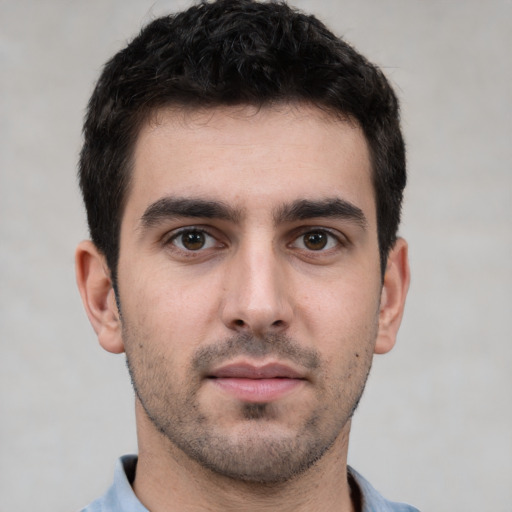 Neutral white young-adult male with short  black hair and brown eyes