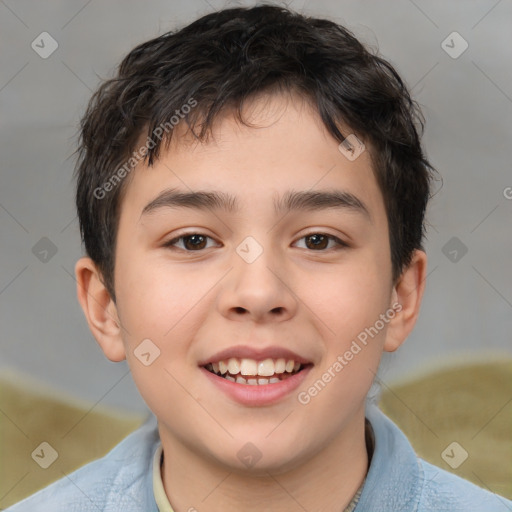 Joyful white child male with short  brown hair and brown eyes