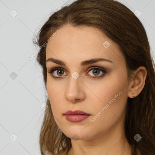 Neutral white young-adult female with long  brown hair and brown eyes