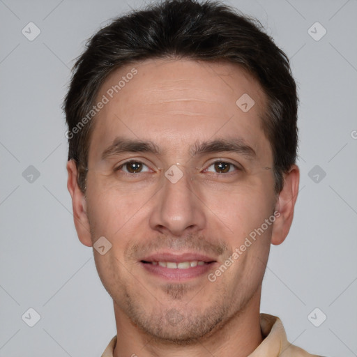 Joyful white adult male with short  brown hair and brown eyes