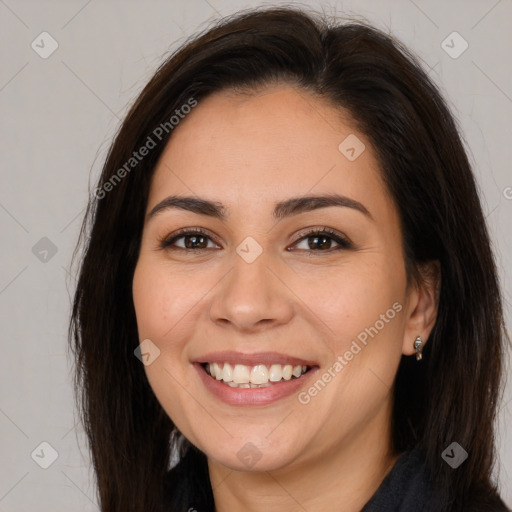 Joyful white young-adult female with long  brown hair and brown eyes