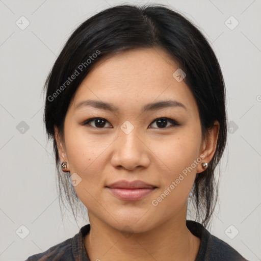 Joyful asian young-adult female with medium  black hair and brown eyes