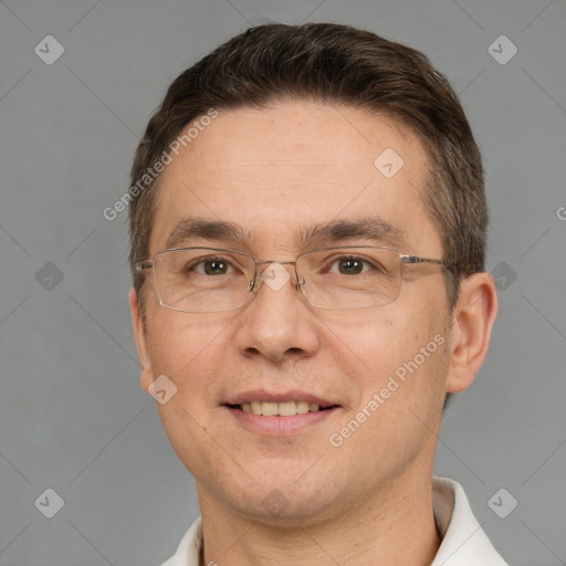 Joyful white adult male with short  brown hair and brown eyes