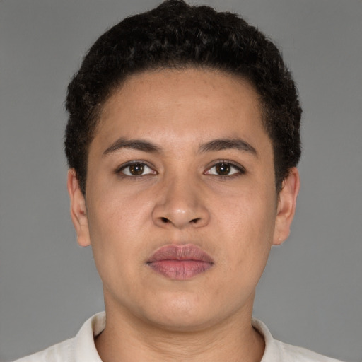 Neutral latino young-adult male with short  brown hair and brown eyes