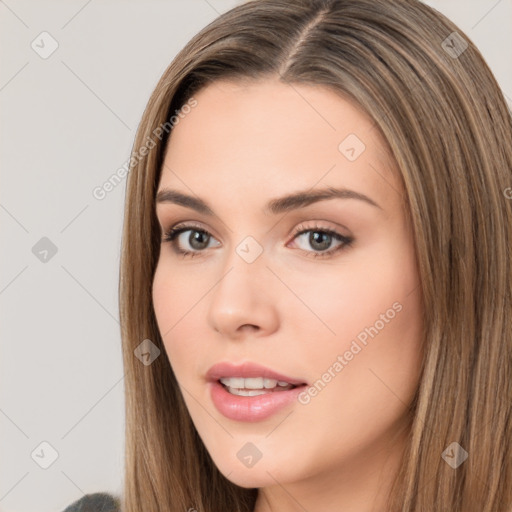 Neutral white young-adult female with long  brown hair and brown eyes