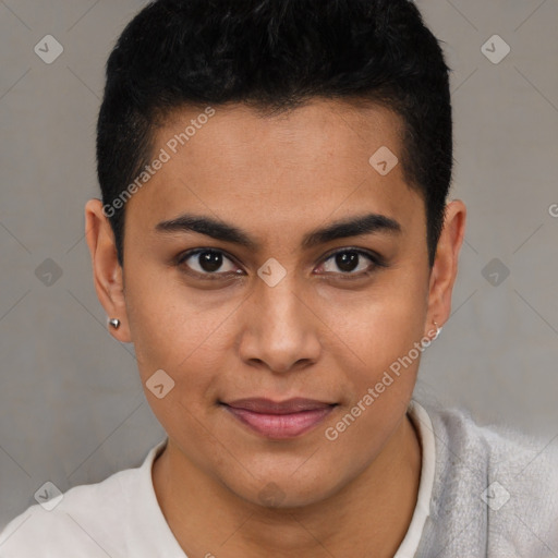 Joyful latino young-adult male with short  brown hair and brown eyes