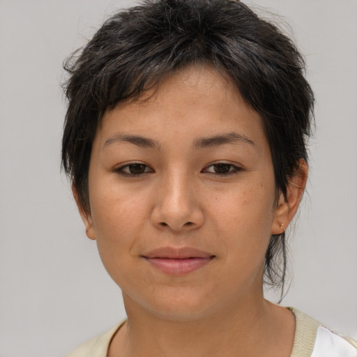 Joyful asian young-adult female with short  brown hair and brown eyes