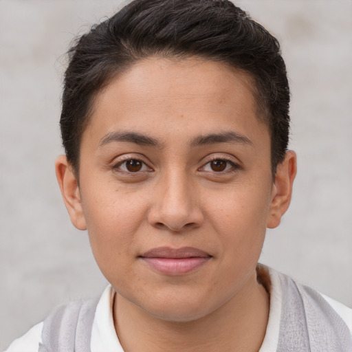 Joyful white young-adult female with short  brown hair and brown eyes