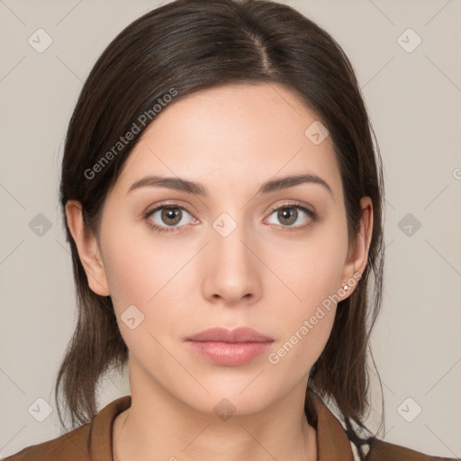 Neutral white young-adult female with medium  brown hair and brown eyes